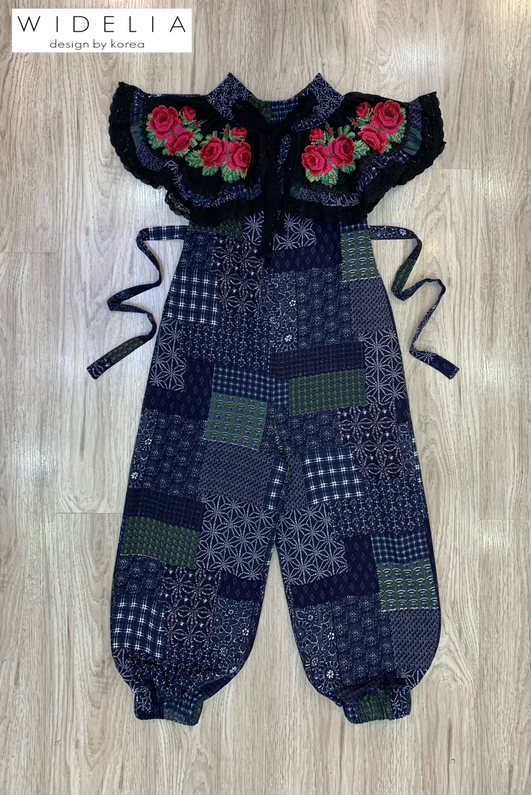 Oc Jumpsuit จั๊มขายาวปาดไหล่แต่งระบายช่วงระบายปักดอกไม้สวย