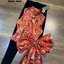 เสื้อคอจีนลวดลายสวยหรูต้อนรับตรุษจีน ชายเสื้อด้านซ้ายแต่งเป็นโบว์ใหญ่สวยอลังการ