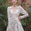 Cameo Dress เดรสตัวสั้นทรงคอวี เเขนยาวพิมพ์ลายดอกไม้ เเต่งย่นๆสวยเกร๋