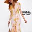 ZR Maxi Dress :: เดรสตัวยาวแขนสั้น. คอวี เป็นเดรสกระดุมหน้าทั้งตัว