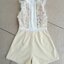 *พร้อมส่ง*Thea Jumpsuit :: จั้มสูทตัวสวย แขนกุด คอตั้งแต่งแถบลูกไม้สวย